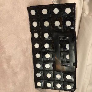 Black and white clutch purse.